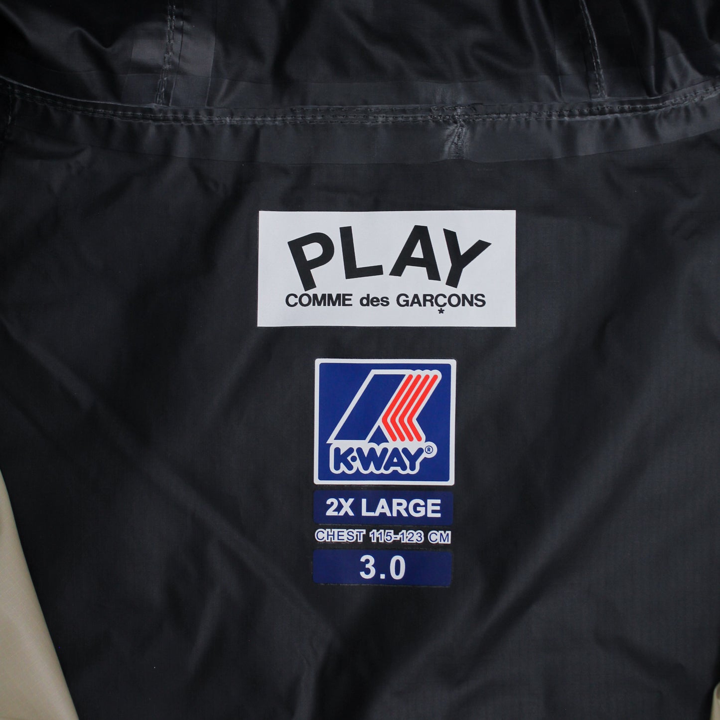 Comme des Garçons Play x K-Way Packable Hooded Windbreaker